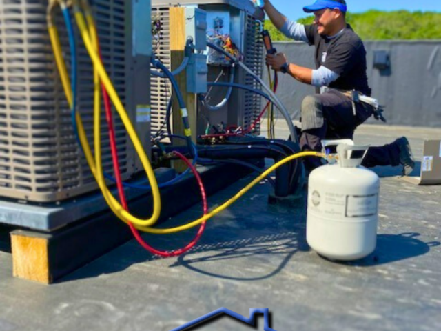 Cool Power Technician Works on Charging up the AC System for Start up 1000x1333